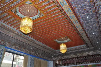 a ceiling with two chandeliers in a room at HOTEL DELTA ATLAS in Casablanca