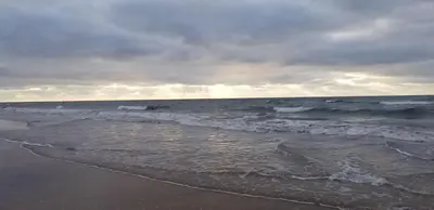 a view of the ocean on a cloudy day at CASA BAY BEACH RETREAT in Sidi Rahal