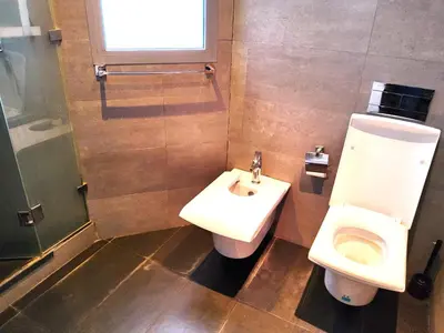 a bathroom with a toilet and a sink at Beautiful View on the sea at Casa-Marina 13 in Casablanca