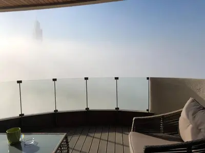 a room with a table and chairs and a large window at KEEP CALM AND THINK OF THE SEA, MARINA!! in Casablanca