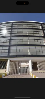 a large building with a lot of windows at Jnane dalia in Bouznika