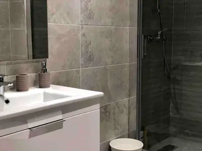 a bathroom with a sink and a shower at Luxury Top Floor, Casablanca Center... in Casablanca