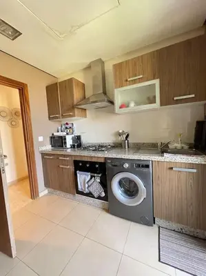 a kitchen with a washer and a washing machine at BEST unit NEAR Casablanca AIRPORT in Casablanca