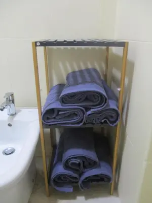 a group of towels on a shelf in a bathroom at Mosquee & Sea View Casablanca in Casablanca