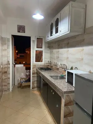 a kitchen with a sink and a counter top at Mohammed V International Airport HOUSE in Nouaseur