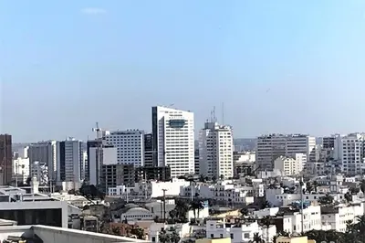 a view of a city with tall buildings at Very beautiful apartment with see view 5th in Casablanca