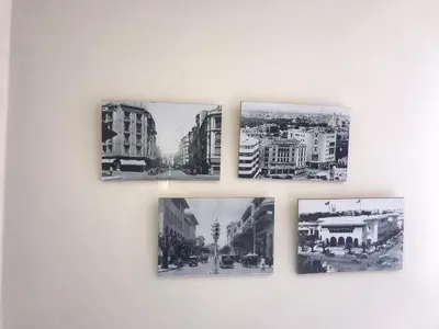 four pictures of a city on a wall at Charming Appartement With a Beautifull View 41 in Casablanca