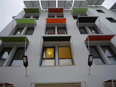 a facade of a building with colorful windows at Gardenia Boutique Hotel in Rabat