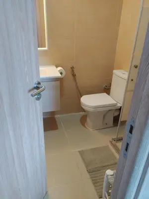a bathroom with a toilet and a sink at Atlantic studio in Atlantic Plaza with Free parking , Available public bus to,from casa port station and downtown in Casablanca