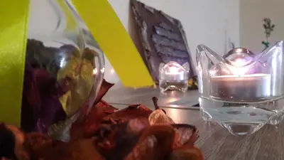 a table with a candle and a glass vase on it at Apartment with Terrace in Casablanca