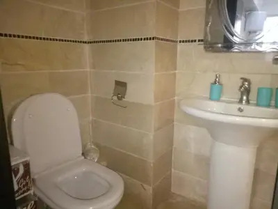 a bathroom with a toilet and a sink at Apartment with Terrace in Casablanca