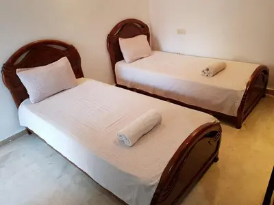 two twin beds in a room with at Apartment with Terrace in Casablanca