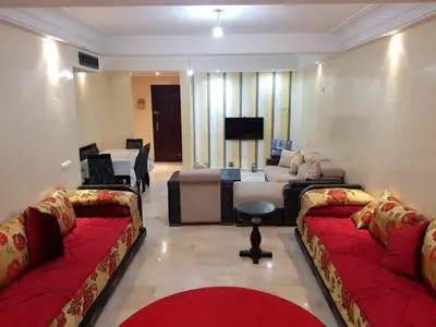 a living room with two couches and a television at Apartment with Terrace in Casablanca