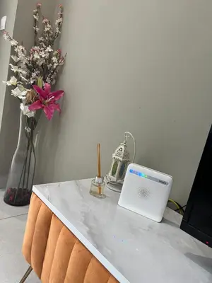 a white table with a laptop on top of it at Luxury appartement in Heart of Casablanca Maarif in Casablanca