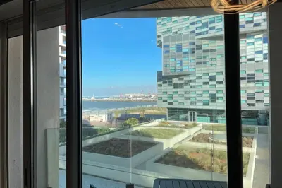 a large window with a view of a building at Brand new, Stylish & Well located Apartment in Casa-Marina 12 in Casablanca