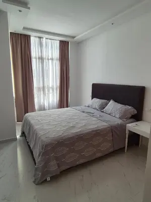 a bedroom with a bed and a large window at My Cosy Place Rabat - RABAT AGDAL GARE TGV ARRIBAT Center in Rabat