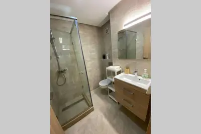 a bathroom with a shower and a sink at Du Haut Standing au coeur du Parc et Plage à 180 m in Mohammedia
