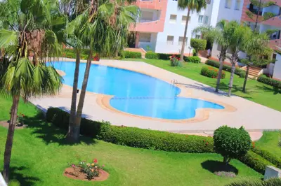 an overhead view of a swimming pool in a resort at Mohammedia pour les vacances in Mohammedia