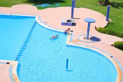 an overhead view of a large swimming pool at Mohammedia pour les vacances in Mohammedia