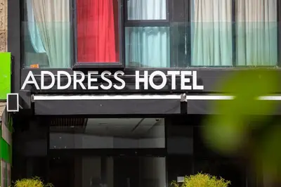 a sign for an address hotel on a building at Address Hotel Casablanca in Casablanca