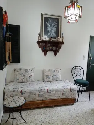 a bedroom with a bed and a picture on the wall at Maison Etoile De Mer 1 in Skhirat