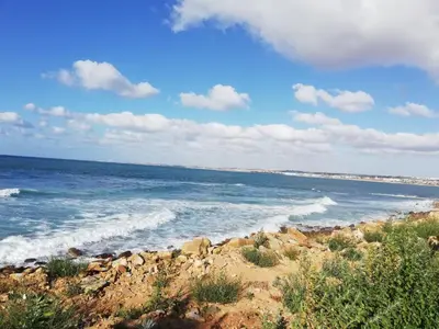 a view of the ocean from the shore of a beach at Chez Amina in Casablanca