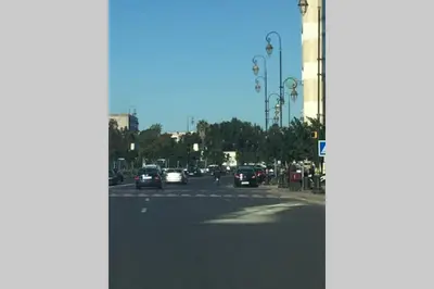 a busy city street with cars driving down the road at Beautiful apart Agdal in Rabat