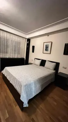 a bedroom with a large bed in a room at Studio de luxe in Casablanca