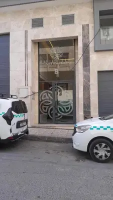 two white cars parked in front of a building at Derb Omar,Tram (L1,L2,L3),Parking and wifi gratuit in Casablanca