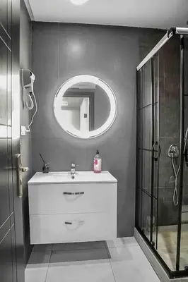 a bathroom with a sink and a mirror at Gauthier studio in Casablanca