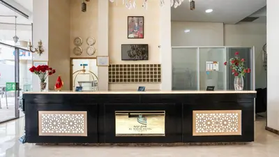 a store front with a counter in a room at Hotel Al Walid in Casablanca