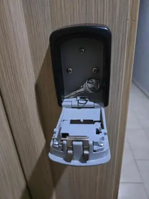 a close up of a door with a machine in it at Joli appartement Mohammédia in Mohammedia