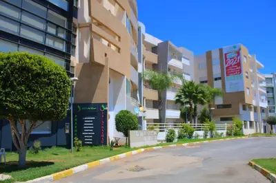 an empty street in front of a building at BOUZNIKA CH1 98 in Bouznika
