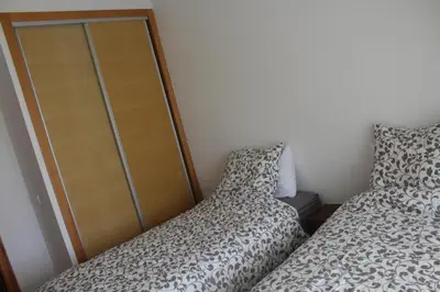 two beds sitting next to each other in a bedroom at MOHAMMEDIA Paradise Beach in Mohammedia