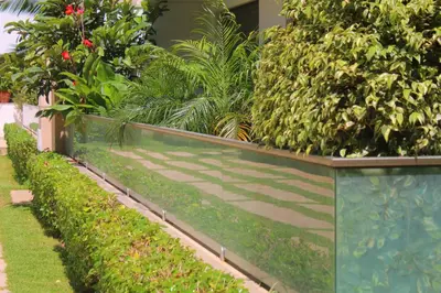 a row of plants on a retaining wall at MOHAMMEDIA L Oasis maritime in Mohammedia