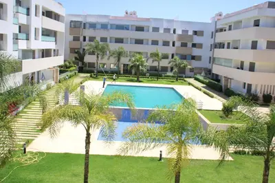 an overhead view of a swimming pool in a building at MOHAMMEDIA L Oasis maritime in Mohammedia