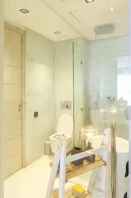 a bathroom with a toilet and a shower and a sink at Tantan golden 5 not far from beach in Casablanca