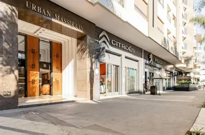 an empty street in front of a store at Massira Diamond Maarif- Parking-wifi-self check in in Casablanca