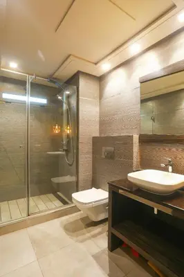 a bathroom with a toilet and a sink and a shower at #26 Maarif urban Massira near twin center casablanca in Casablanca