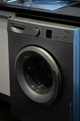 a washing machine in a room with a counter at Racine Two bedroom flat near twin center in Casablanca