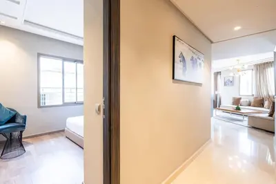 a living room with a couch and a table at #56 Maarif Racine urban Massira near twin center in Casablanca