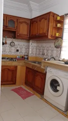 a kitchen with a washing machine in a kitchen at Paradise house in Casablanca