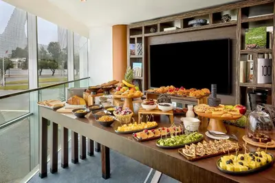 a buffet with many different types of food on a table at Rabat Marriott Hotel in Rabat