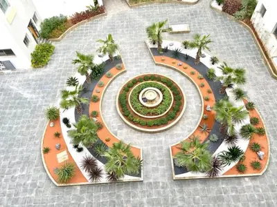 an aerial view of a garden with palm trees at Anfa Living 23-BREATHTAKING SEA VIEW NEW&CHIC 5 in Casablanca