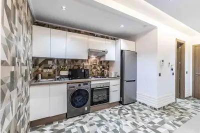 a kitchen with a stove and a dishwasher at Metropolitan 19- 2 BEDROOMS with terrace NEW&SUNNY in Casablanca