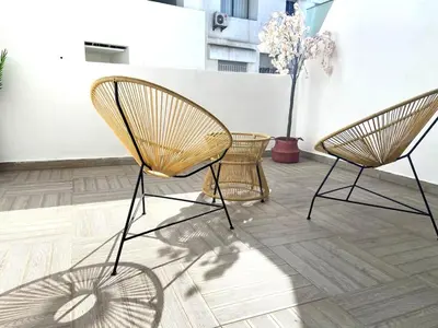 two chairs sitting on top of a floor at Metropolitan 19- 2 BEDROOMS with terrace NEW&SUNNY in Casablanca