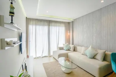 a living room with a couch and a glass table at #34 New Flat in new Garden Residence in Casablanca