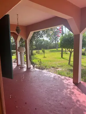 an open porch with a view of a park at Atlantic Vacation villa in Dar Oulad Hajj Kassem