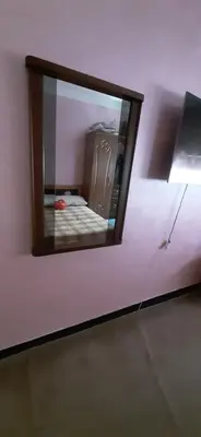 a mirror on a wall in a room at Apartment in the center of Casablanca in Roches Noires