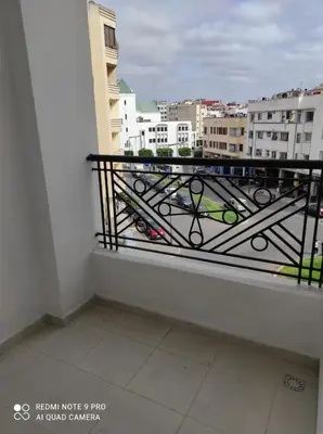 a balcony with a view of a city at Apartment place italie in Rabat